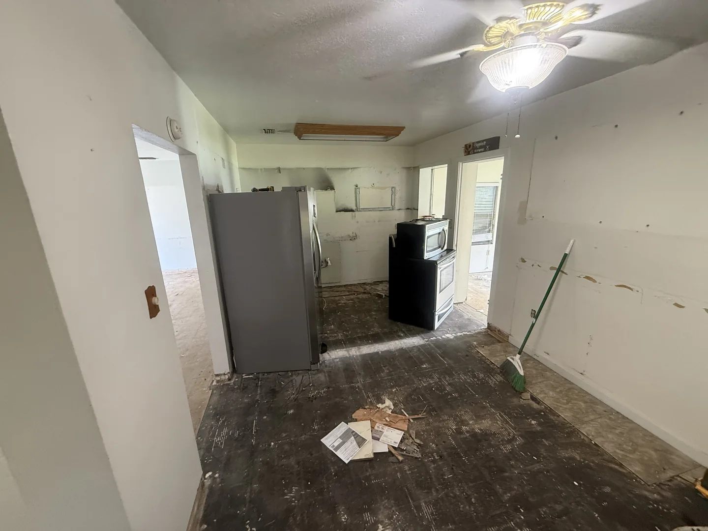 Kitchen removal in progress, with cleanup still to follow